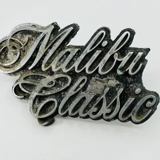 Photo of 1977 Chevrolet Chevy Malibu Classic Grille Emblem Ornament Nameplate SB6
