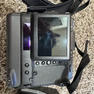 Photo of Fuji GFX 100 with 4 batteries low shutter count