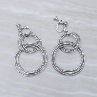 Photo of Vintage Clip On Earrings Long Dangle Textured Silver Tone Interlocking Circles