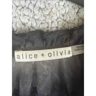 Photo of Alice + Olivia Black Size XS Long Sleeve Silk Blouse Sheer Sleeve Tie Neck Geo