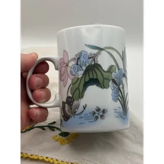 Photo of Vintage Ceramic Teacup Mug with Waterlily and Lotus Flower Design with Butterflies