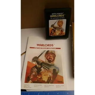 Photo of Warlords 23 game atari game cartridge with box and instructions