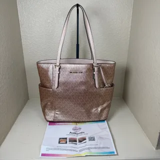 Photo of Michael Kors Jet Set Travel tote bags n pink metallic EUC with COA