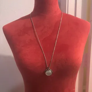 Photo of Silver tone pocket watch pendant