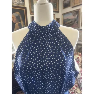 Photo of Long Sleeveless Blue Dress With White Polka Dots.