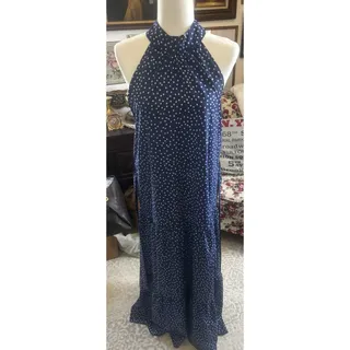 Photo of Long Sleeveless Blue Dress With White Polka Dots.