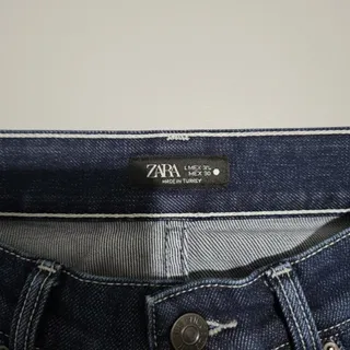Photo of ZARA High Rise Tapered Denim Jogger Pants Dark Wash Pleated Ankle Cuff