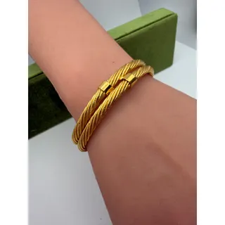 Photo of vintage Trifari gold-tone double strand twisted rope hinged bangle bracelet