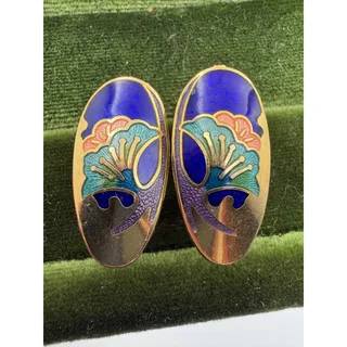 Photo of vintage oval cloisonné enamel earrings featuring a blue background