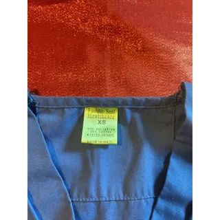 Photo of Fashion Seal Healthcare Scrub Top Unisex XS Blue V-Neck Lincoln Tech Logo Pocket