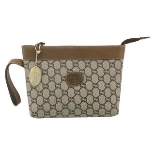 Photo of Gucci GG Plus Clutch Bag Gold