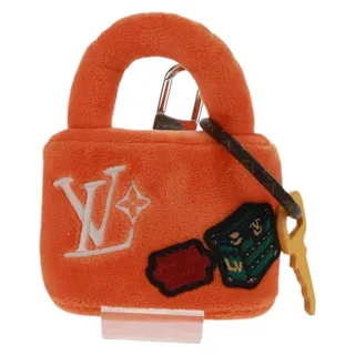 Photo of Louis Vuitton LV Lucky Rock Bag Charm Fur Orange