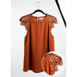 Photo of Monteau Los Angeles embroidered sleeve Top in a warm terracotta orange hue