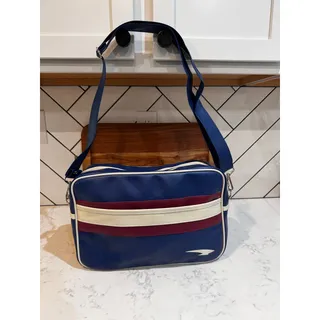 Photo of Skechers faux leather messenger/carry-on bag blue body burgundy accent Y2K retro
