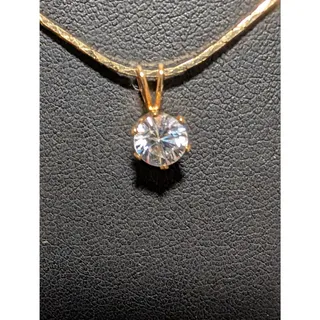 Photo of Gold Tone Necklace With Crystal Solitaire Pendant