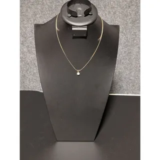 Photo of Gold Tone Necklace With Crystal Solitaire Pendant