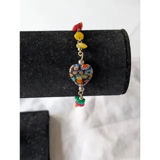Photo of Silver Tone Charm Bracelet With A Millefiori Glass Heart Center Bead