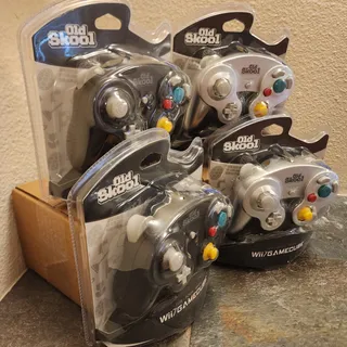 Photo of 4 Gamecube Controllers - Black & Silver/Platinum (NEW) - Nintendo - Old Skool