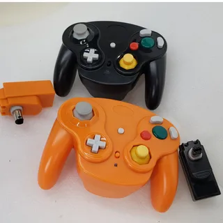Photo of PGFYDAL 2.4G Wireless GameCube Controllers w Wireless Receivers. Orange & Black