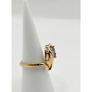 Photo of Vintage HGE Purple Oval Stone Two Tone Swirl Cocktail Ring