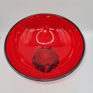 Photo of Red glass centerpiece bowl decorative metal base with holly leaves red berries
