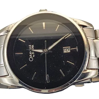 Photo of Caravelle by Bulova Men's Silver Tone Black Dial Quartz Watch
