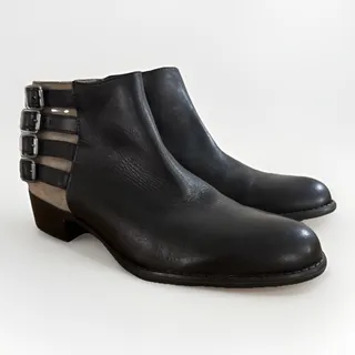Photo of Franco Sarto  Black And Tan Letter Buckle Booties - Women's 9