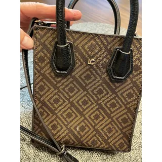 Photo of Liz Claiborne Compact Crossbody Bag in Geometric Brown And Black