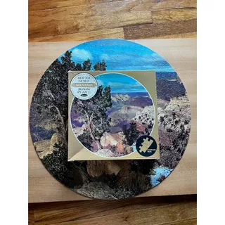 Photo of round jigsaw puzzle grand canyon 650 pieces