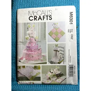 Photo of McCalls 6301 Sewing pattern toy decoration burp cloth blanket hooded towel diaper cake
