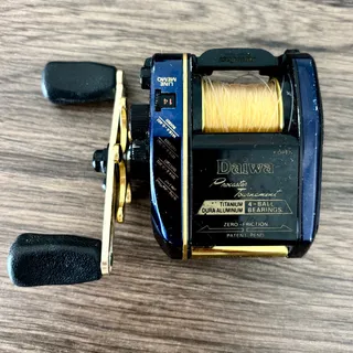 Photo of Vintage Daiwa Procaster Tournament Baitcaster Fishing Reel PT15ZX - Blue