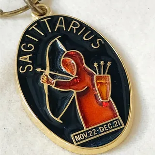 Photo of Vintage Key Carriers Sagittarius Key Ring | 1970s Enamel Brass Zodiac Keychain
