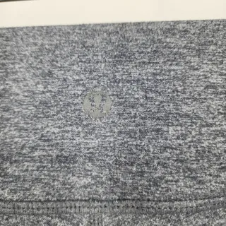 Photo of Lululemon Heathered Gray Cropped High Rise Athletic Soft Leggings Size 4