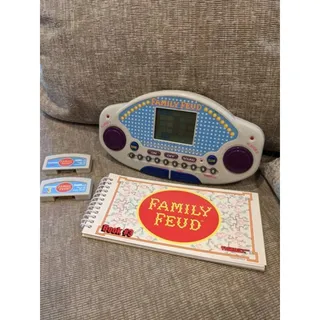 Photo of 1997 VTG Tiger Electronics Family Feud HandGame w/ 2 Cartridges & Survey Book