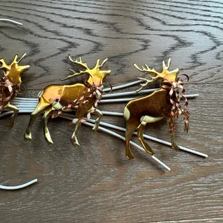 Photo of Vintage Metal Santa, Reindeer with Bows and Sleigh Holiday Home Decor