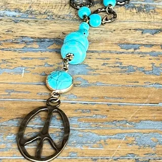 Photo of Chandler Peace Sign Beaded Necklace | Turquoise & Bronze | Dylan Designs