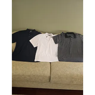 Photo of Greg Norman Men's XL Golf Shirts (Lot of 3) Navy, White, Black