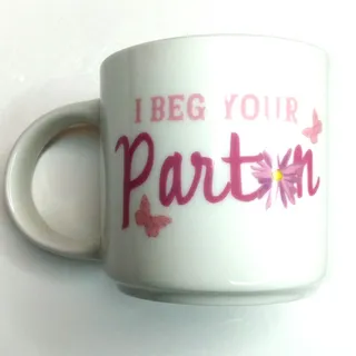 Photo of Dolly Parton "I Beg Your Parton" 16oz Ceramic Mug - White & Pink