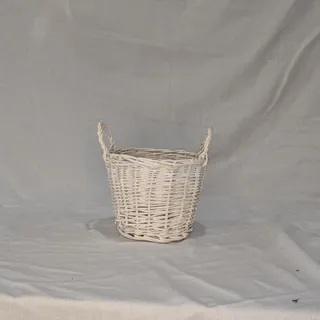 Photo of White wicker basket with handles