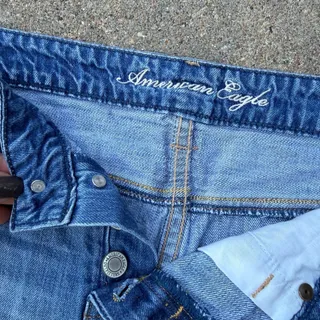 Photo of Y2K American Eagle Low Rise Button Fly Blue Jean Micro Mini Jean Shorts Size 10