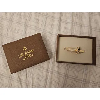 Photo of OTAA Gold Skull and Crossbones 5 cm Tie Bar NIB