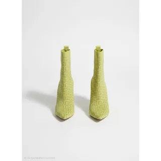 Photo of Steve Madden Size 10 Neon Yellow Geometric Sock Ankle Boots - Gently Used
