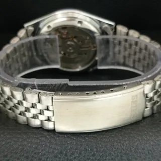 Photo of Vintage 1989 Seiko Automatic Mens Silver Watch W/daydate & White accents