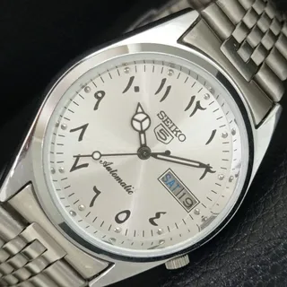 Photo of Vintage 1989 Seiko Automatic Mens Silver Watch W/daydate & White accents