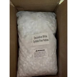Photo of Decorative white synthetic river pebbles