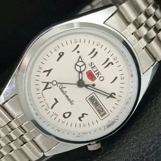 Photo of Vintage 1983 Seiko Automatic Mens Silver Watch W/daydate & Red accents