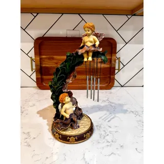 Photo of vintage resin Cherub Angel Wind Chime Figurine 90s on leafy arch w/chimes decor 