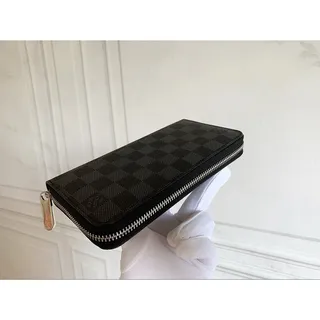 Photo of Louis Vuitton Black Textured Zip Around Long Wallet