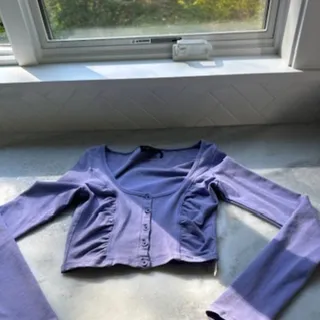 Photo of NWOT Urban Outfitters Out From Under Button Front Long Sleeve Crop Top