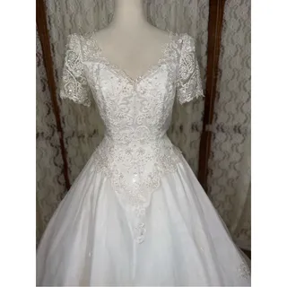 Photo of Gorgeous Vintage 90s Michaelangelo Ballgown Wedding Gown